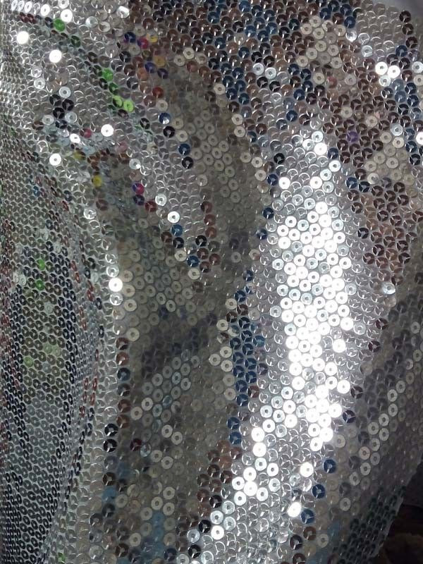 Tejido de lentejuela cosida