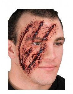 Prótesis de látex arañazo...