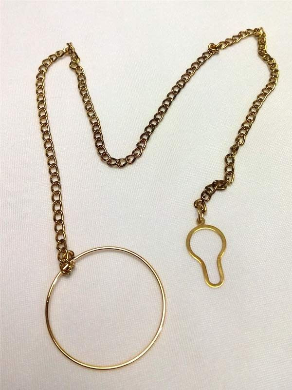 Monóculo con cadena