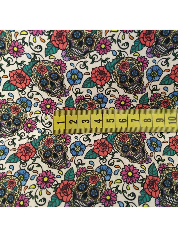 Tela calaveras florales de algodón