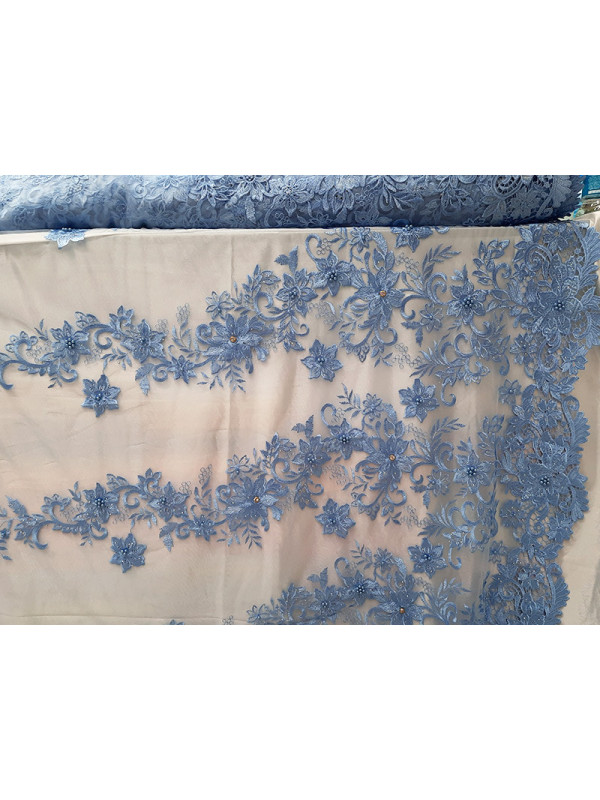 Tul bordado con pedrería Renato celeste