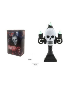 Candelabro con calavera